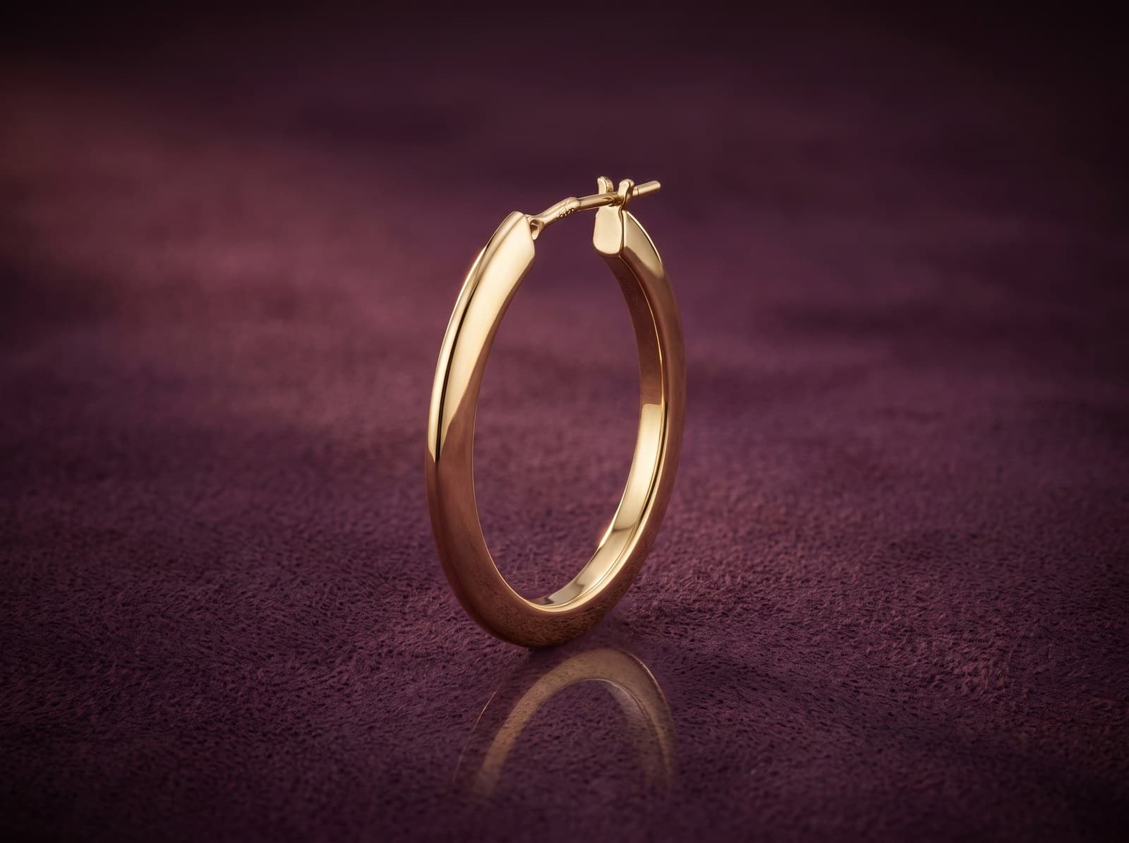 Mahaba · Modern Oval Hoop Gold Earring — studio