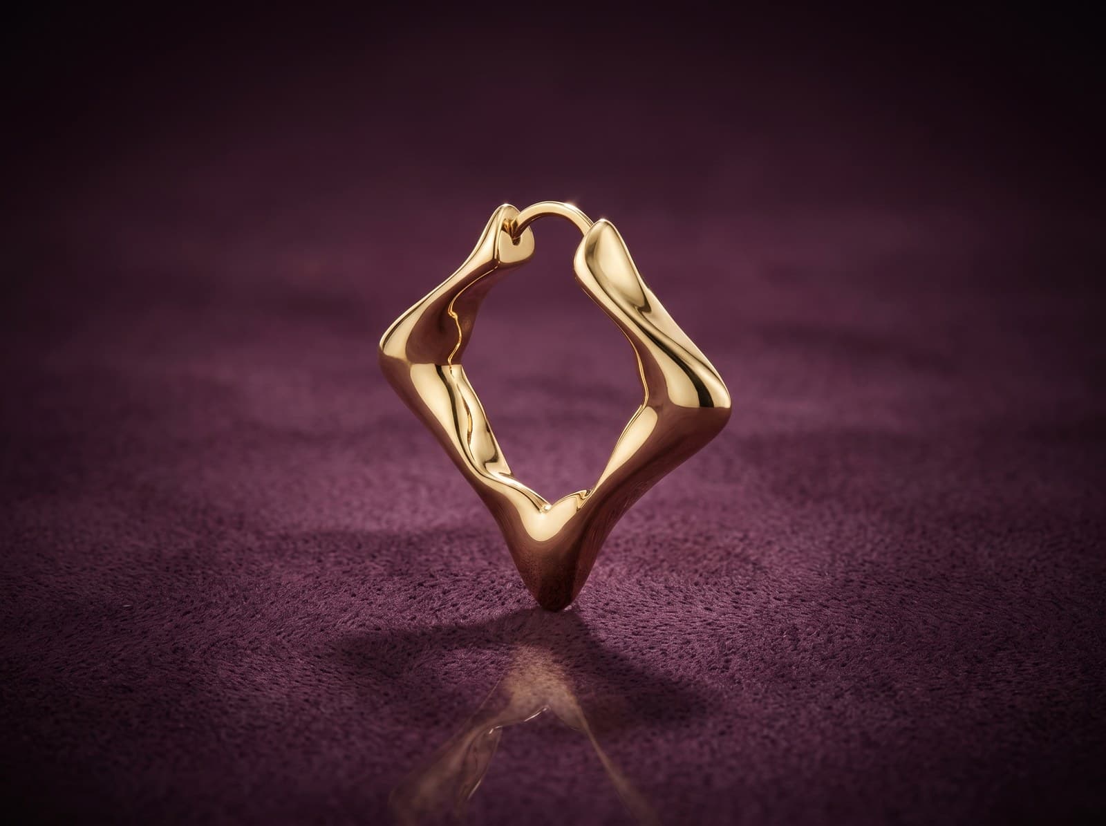 Shafaq · Looped Rhombus Clip-On Gold Earring — studio