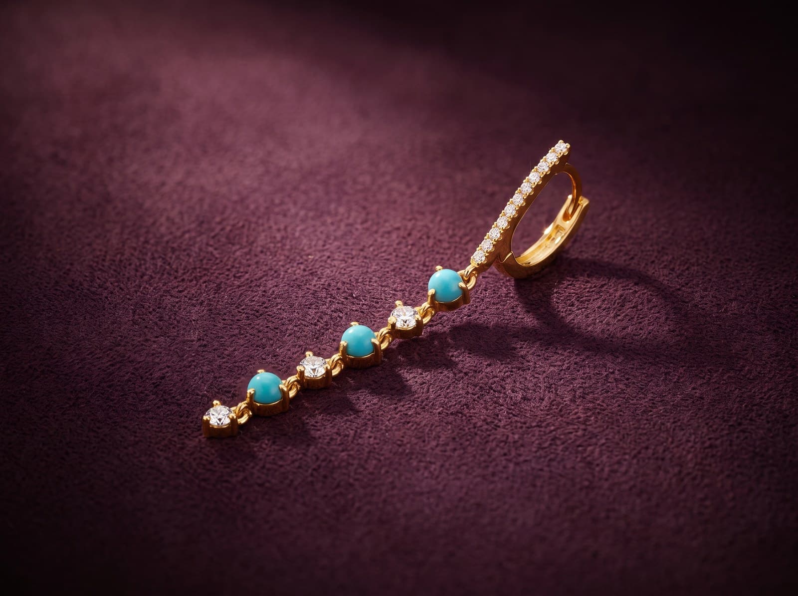 Ibra · Dropped Turquoise Hoop Diamond Piercing
