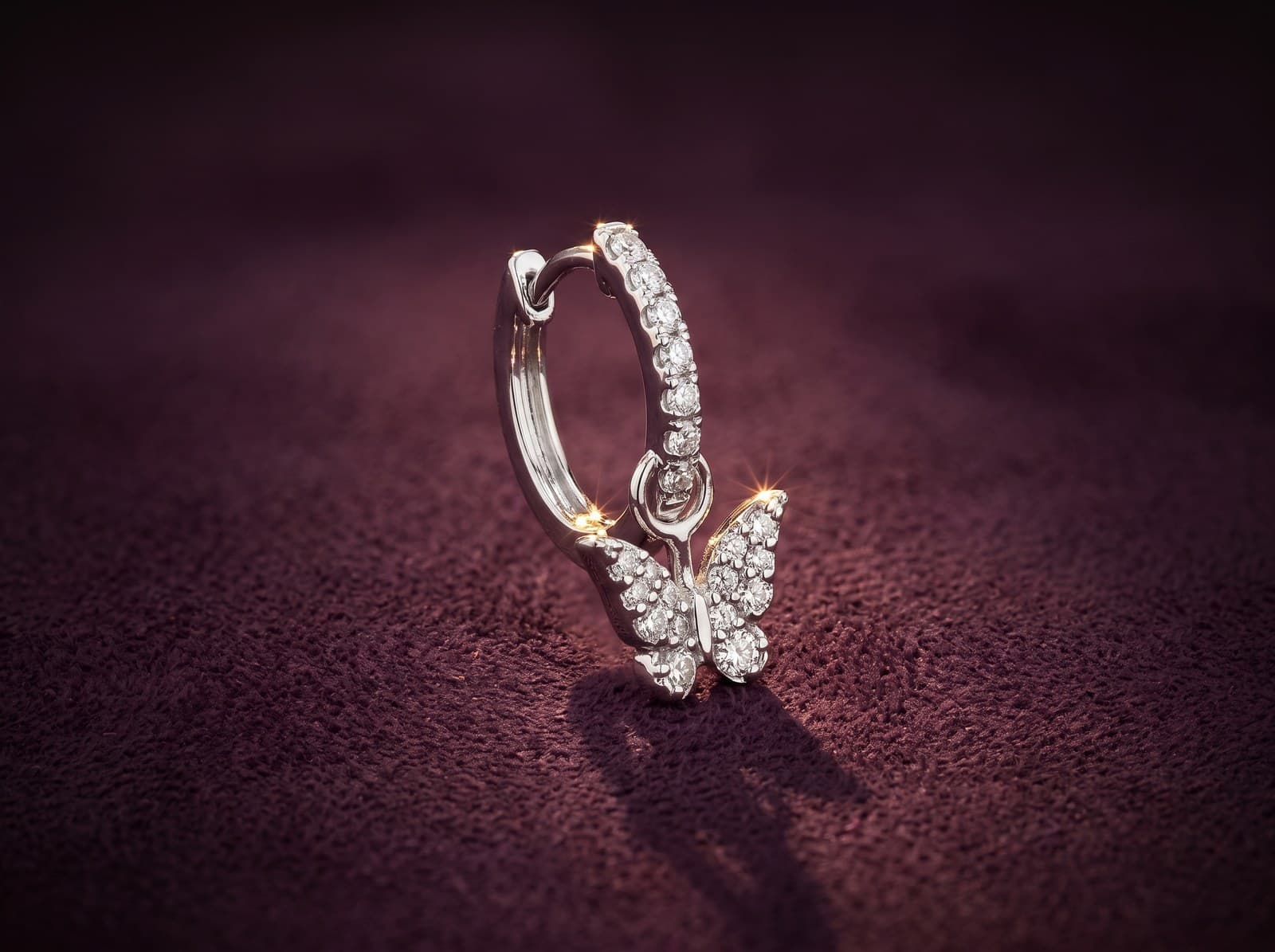 Wasm · Butterfly Shaped Hoop Diamond Piercing