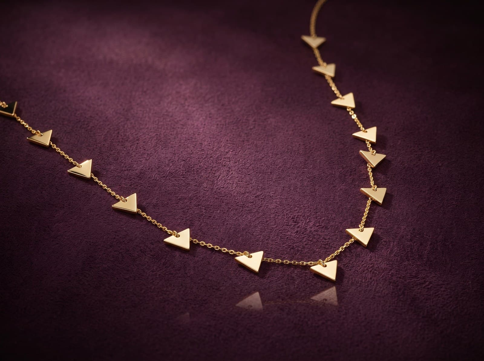Shada · Shinny Dropping Triangles Gold Necklace — studio